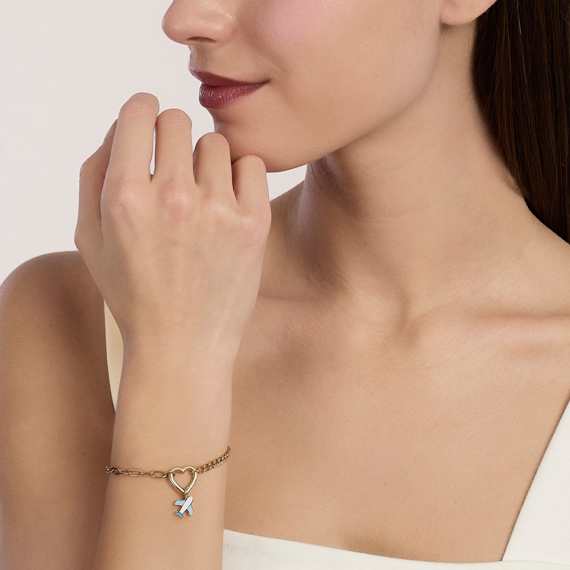 Bracciale componibile con catena groumette e a maglie allungate in acciaio dorato