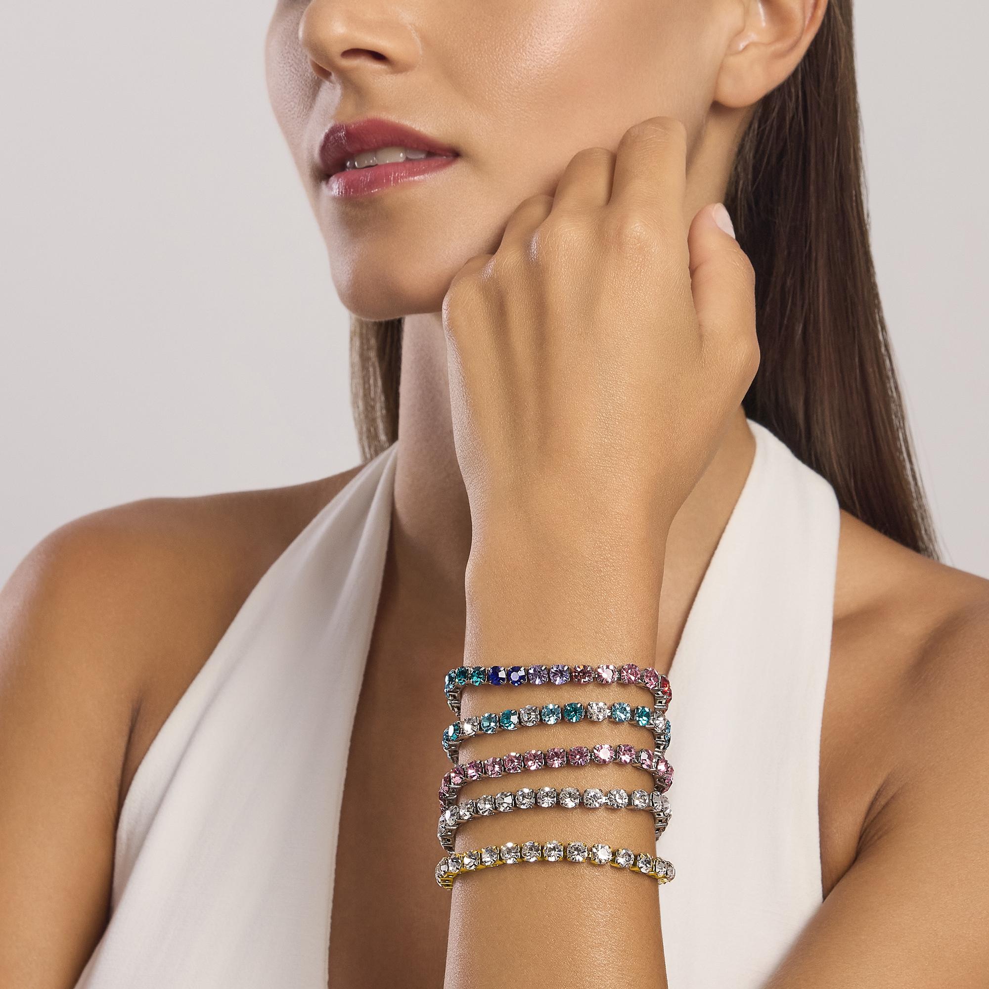 Bracciale tennis dorato con cristalli bianchi
