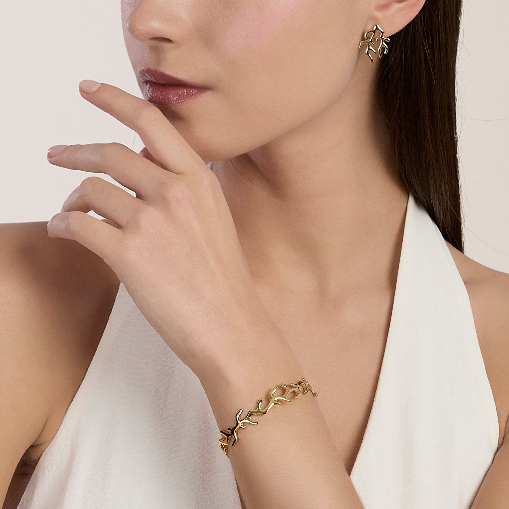 Bracciale cuff in acciaio dorato