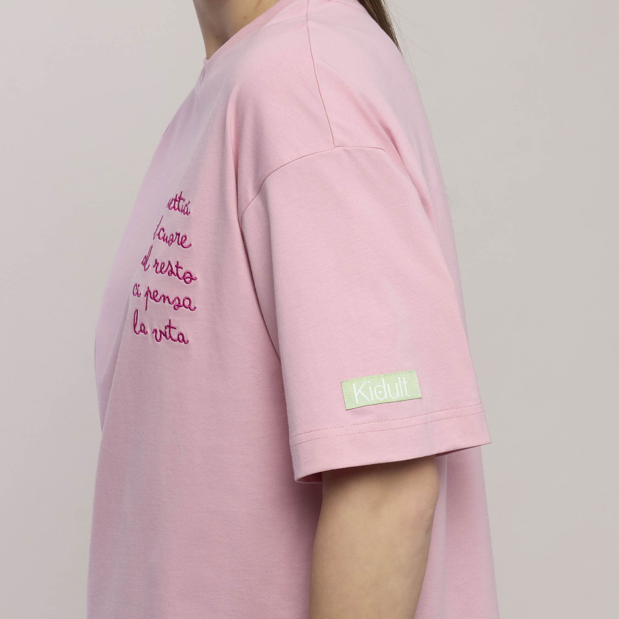 Maglia oversize donna con frase "Mettici il cuore al resto ci pensa la vita"